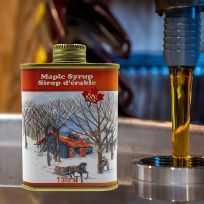 Tins filled with Pure Maple Syrup 100%